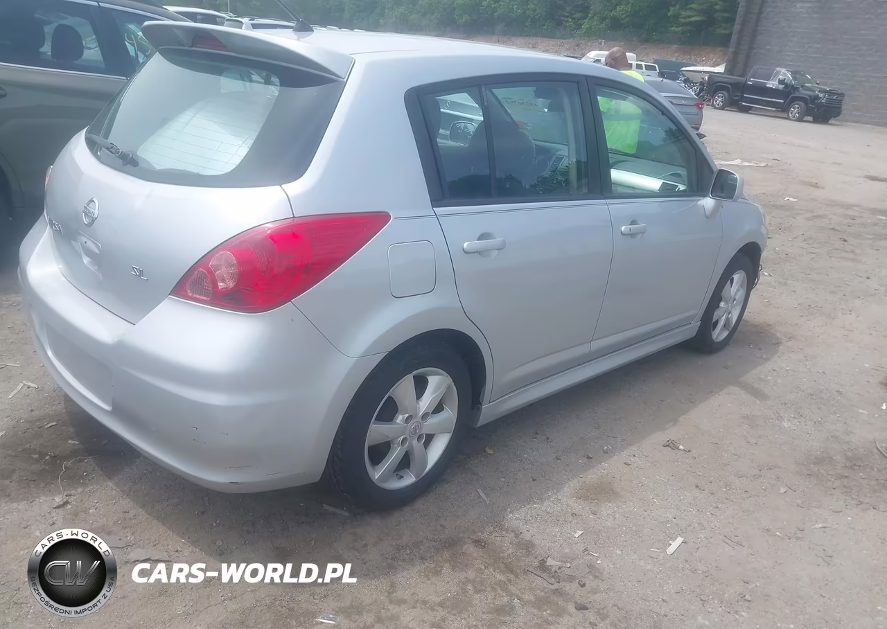 2010 Nissan Versa 1.8Sl VIN:3N1BC1CP9AL403660 - 4