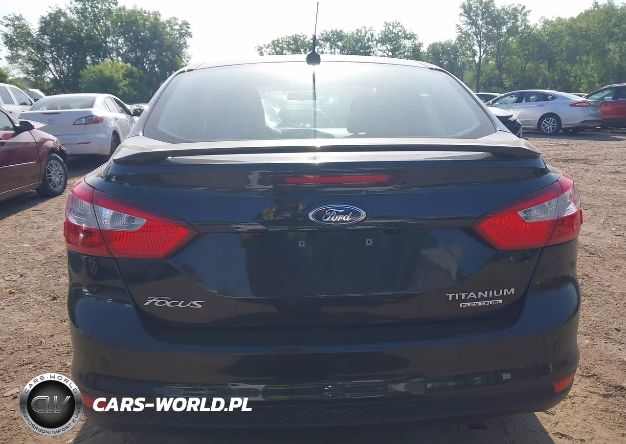2013 Ford Focus Titanium VIN:1FADP3J27DL383976 - 15