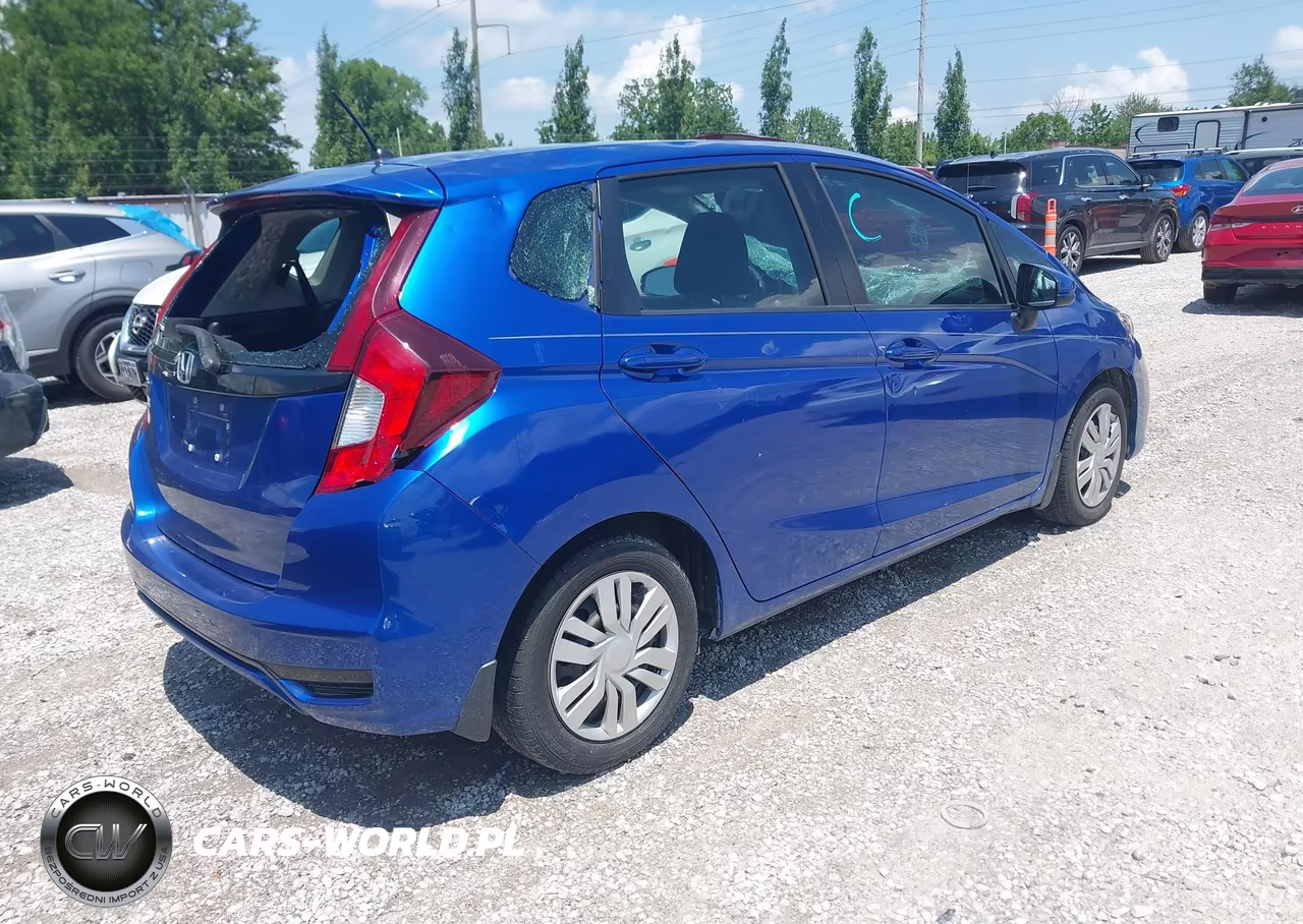 2018 Honda Fit Lx VIN:3HGGK5H49JM704341 - 4