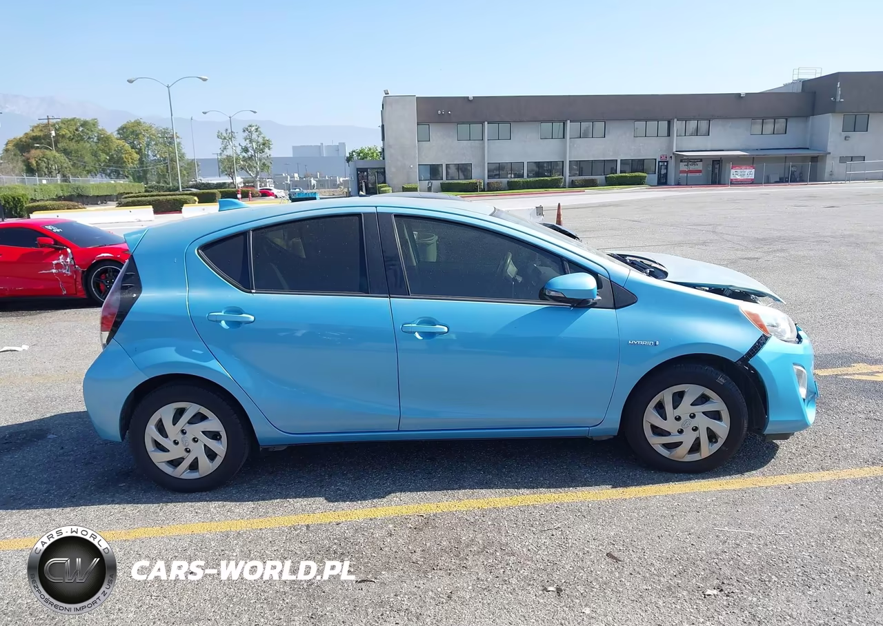 2015 Toyota Prius C Four-One-Three-Two VIN:JTDKDTB34F1104404 - 13