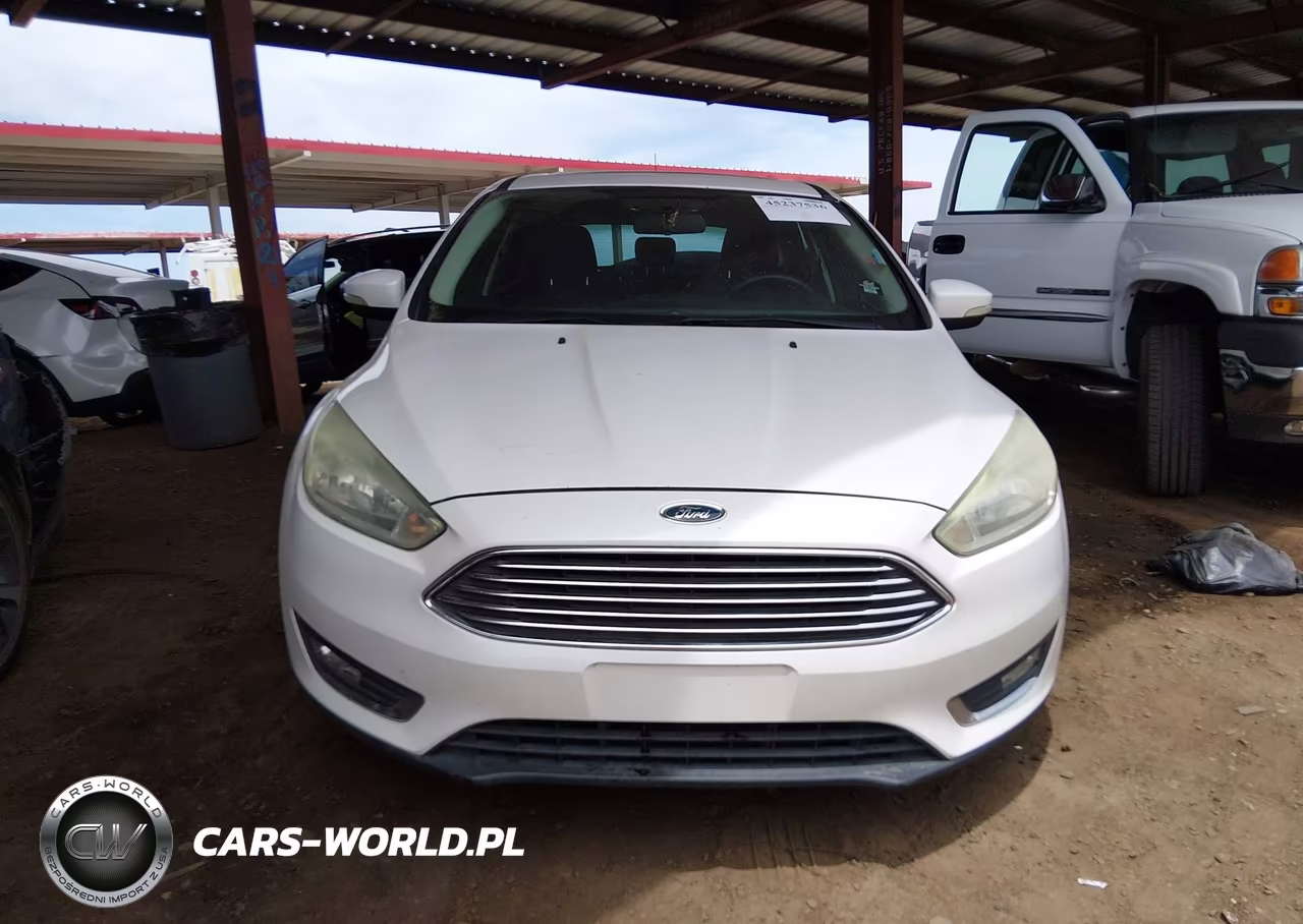 2016 Ford Focus Titanium VIN:1FADP3N28GL259990 - 12