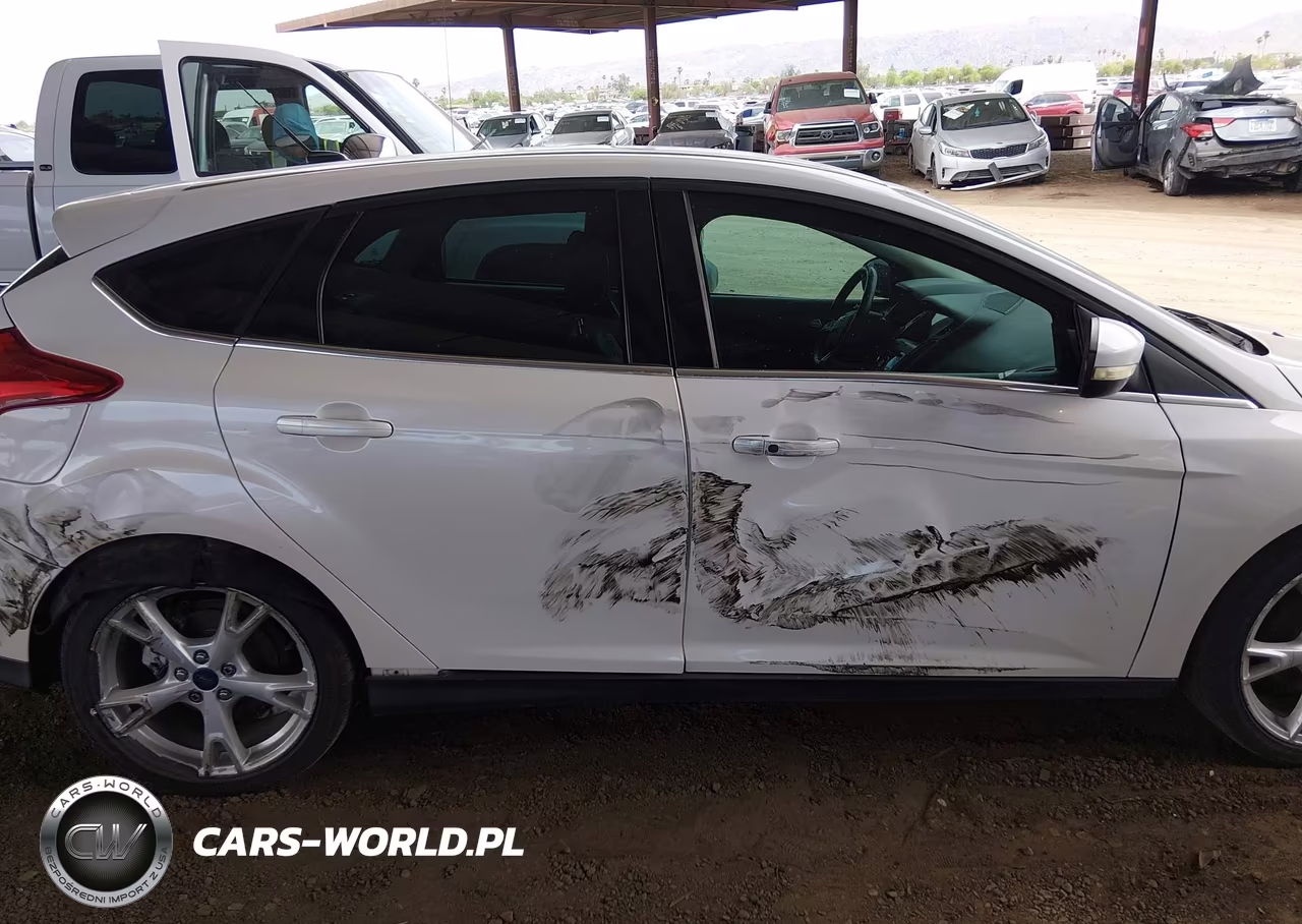 2016 Ford Focus Titanium VIN:1FADP3N28GL259990 - 13