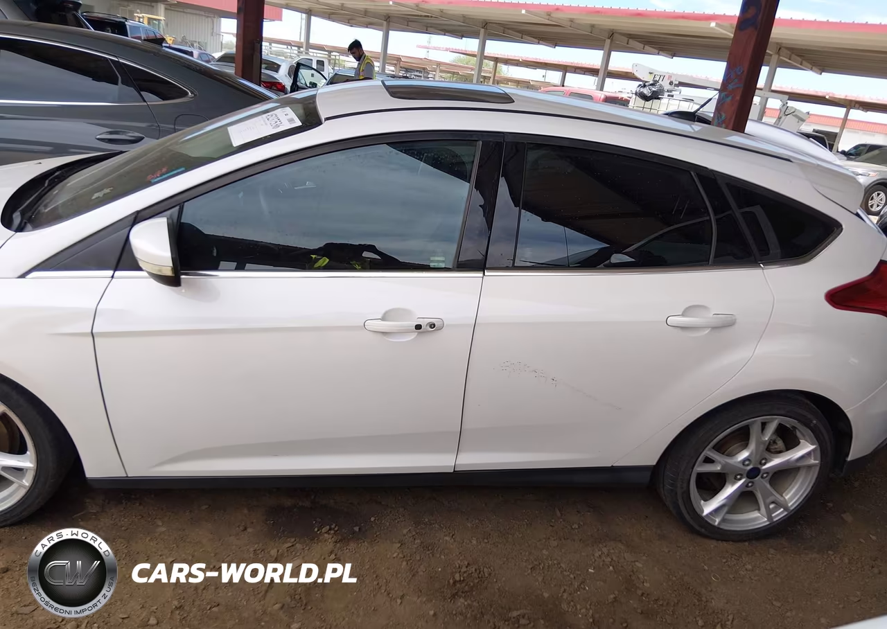 2016 Ford Focus Titanium VIN:1FADP3N28GL259990 - 14