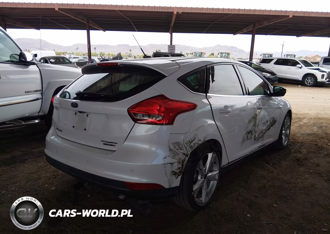 2016 Ford Focus Titanium VIN:1FADP3N28GL259990 - 4