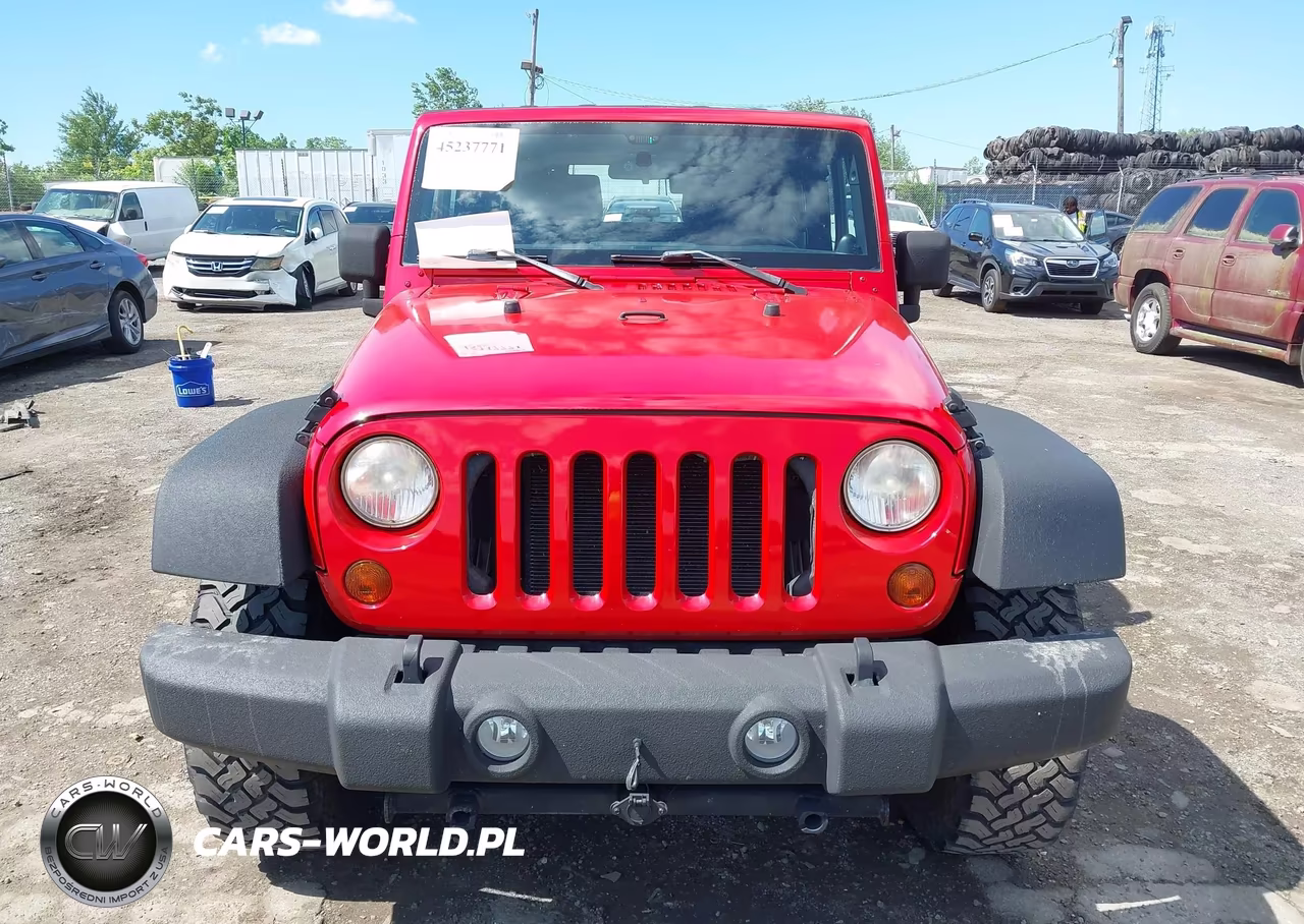 2011 Jeep Wrangler Sport VIN:1J4AA2D1XBL518421 - 12