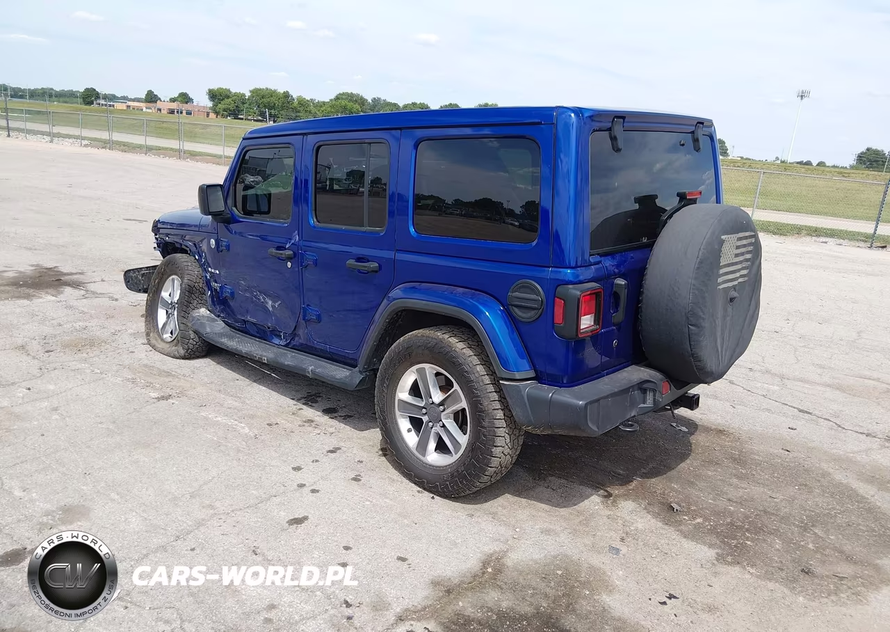 2019 Jeep Wrangler Unlimited Sahara 4X4 VIN:1C4HJXEN0KW504688 - 3