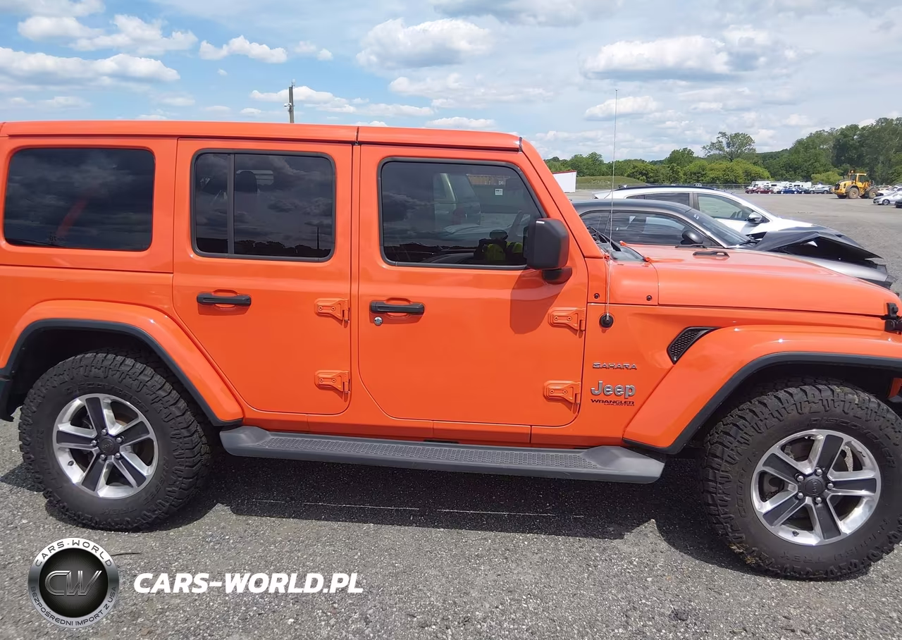 2019 Jeep Wrangler Unlimited Sahara 4X4 VIN:1C4HJXEN9KW522753 - 13
