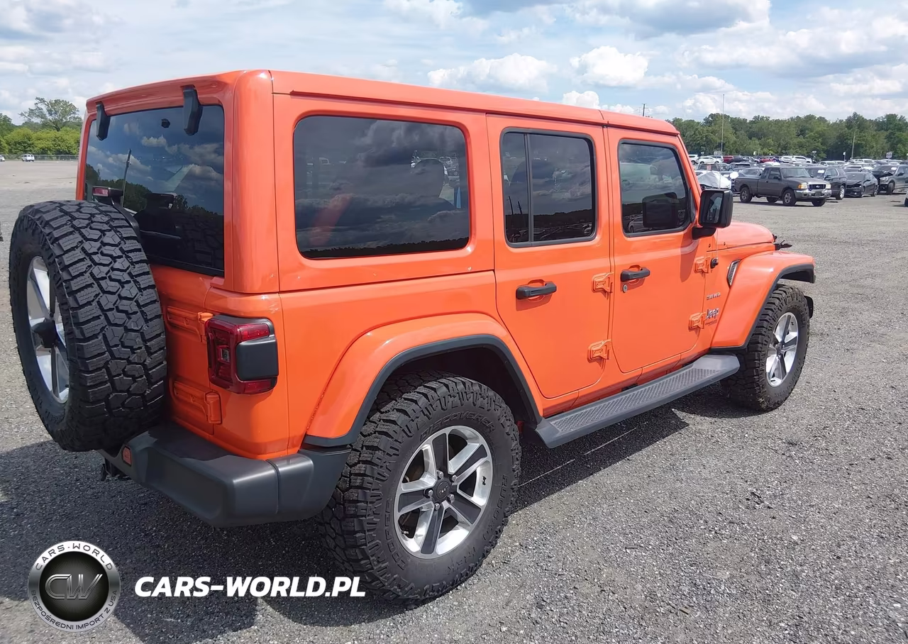 2019 Jeep Wrangler Unlimited Sahara 4X4 VIN:1C4HJXEN9KW522753 - 4