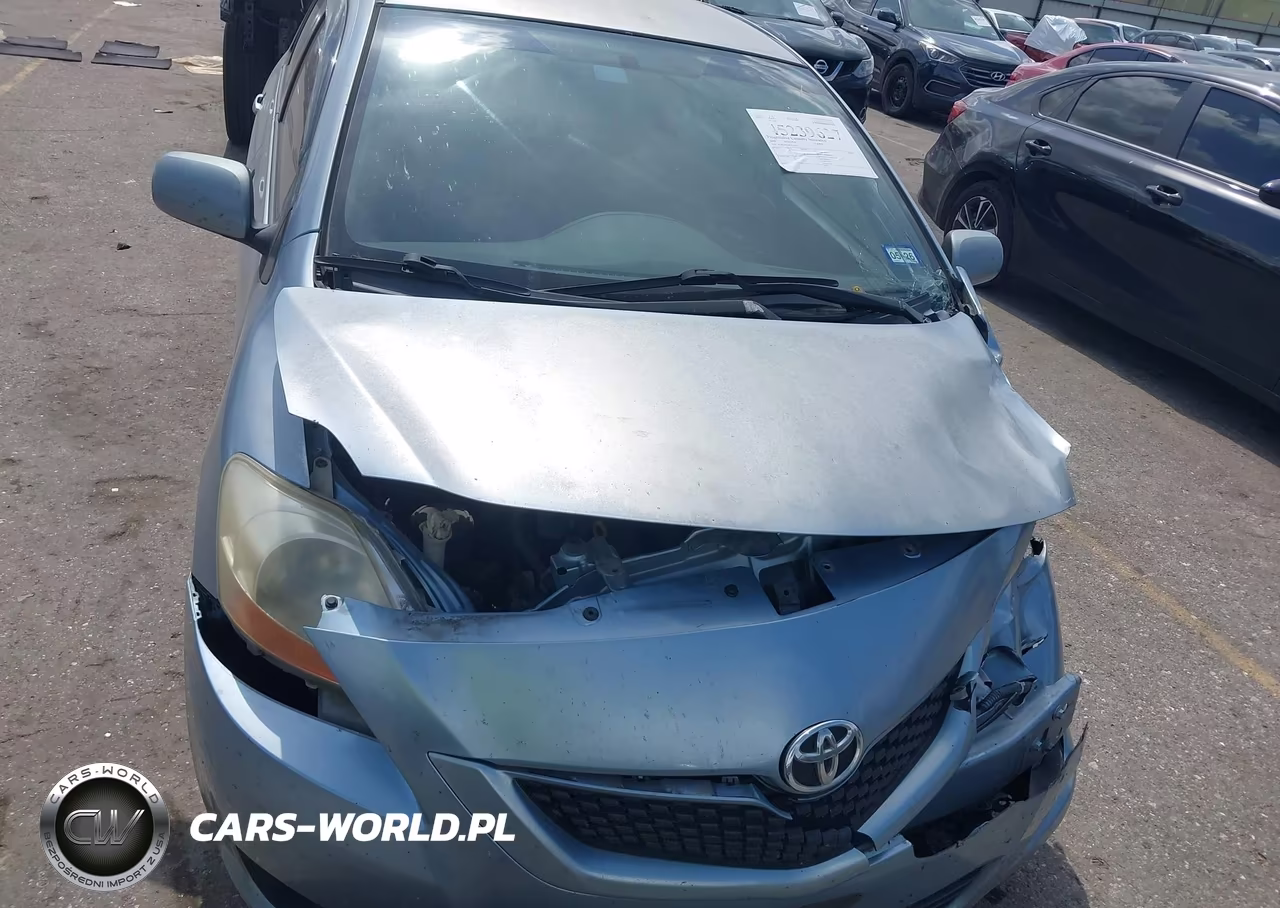 2009 Toyota Yaris VIN:JTDBT903391332150 - 12