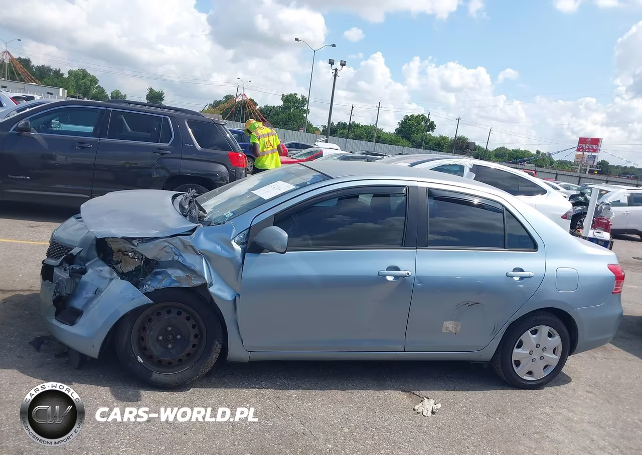 2009 Toyota Yaris VIN:JTDBT903391332150 - 14