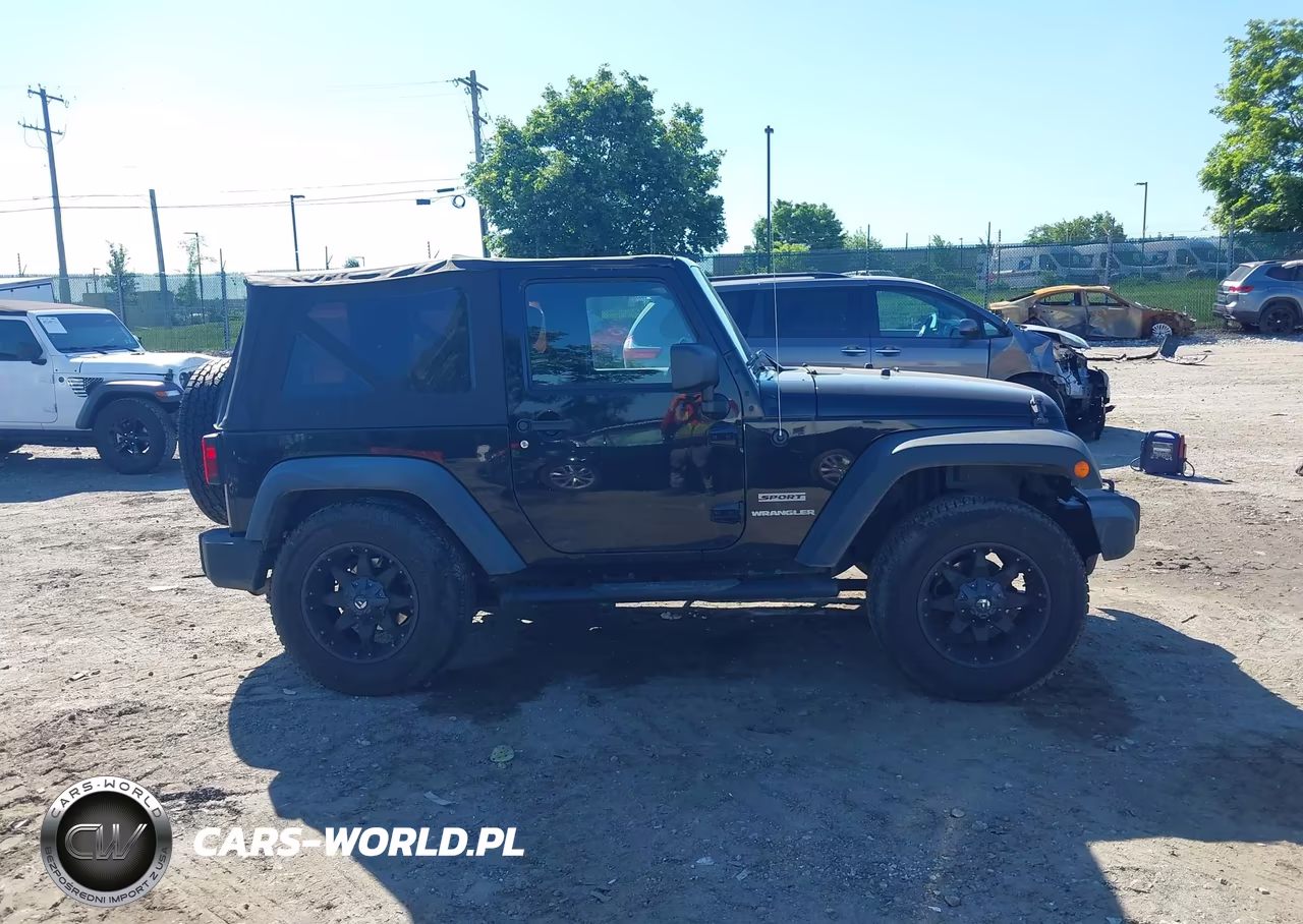 2011 Jeep Wrangler Sport VIN:1J4AA2D10BL557860 - 13