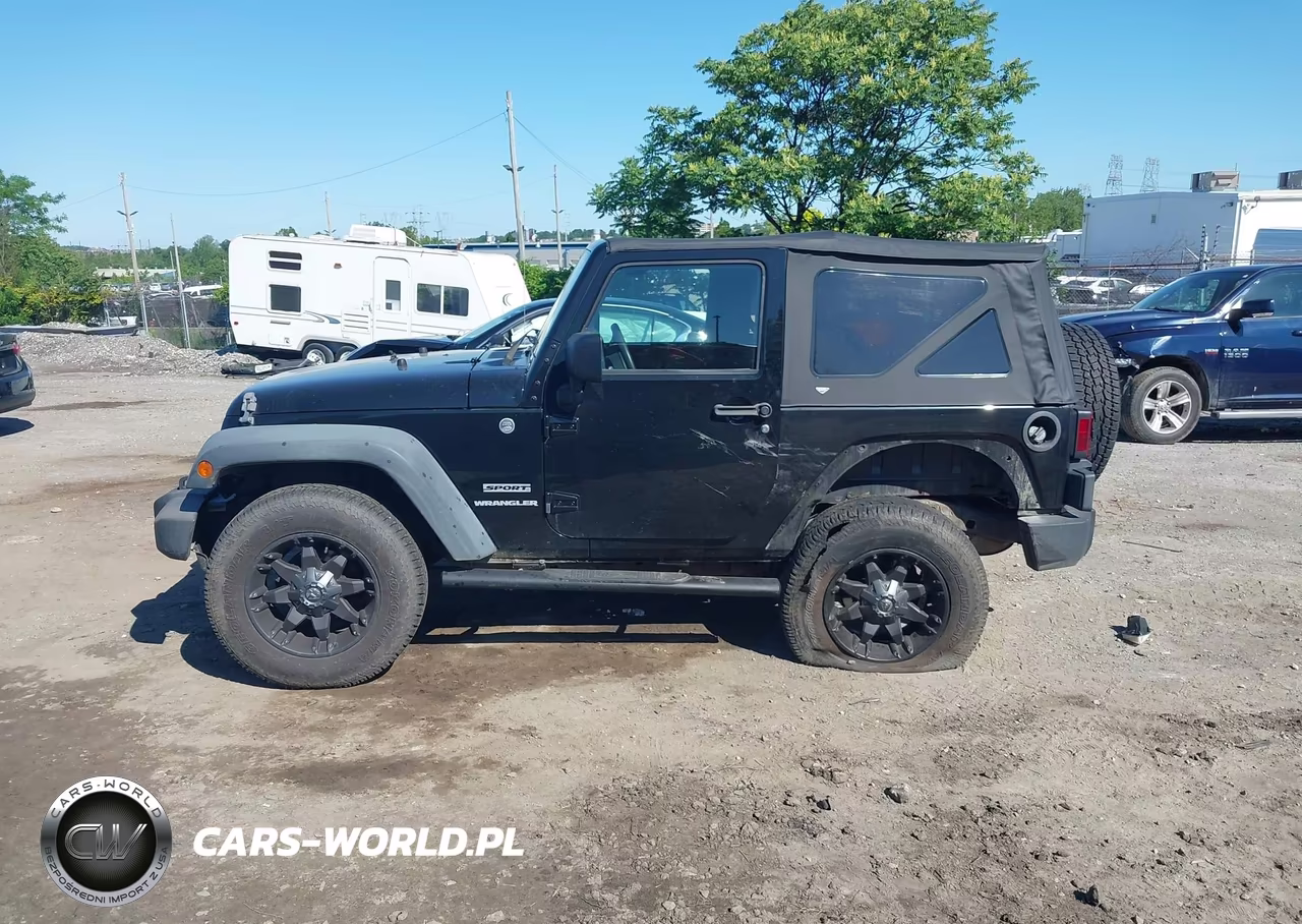 2011 Jeep Wrangler Sport VIN:1J4AA2D10BL557860 - 14