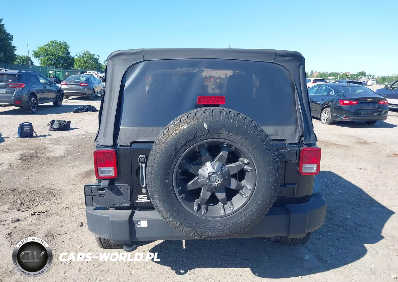 2011 Jeep Wrangler Sport VIN:1J4AA2D10BL557860 - 16