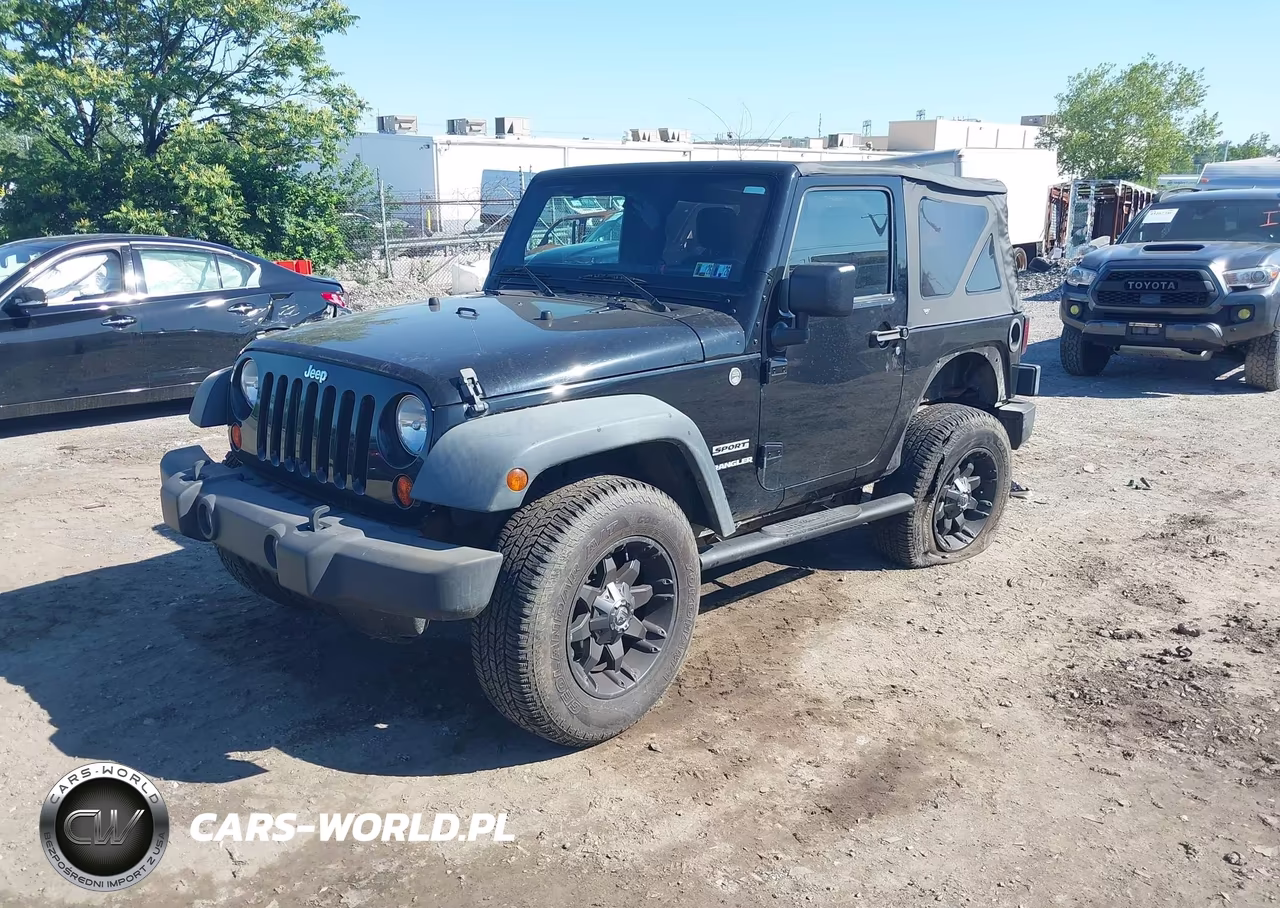 2011 Jeep Wrangler Sport VIN:1J4AA2D10BL557860 - 2