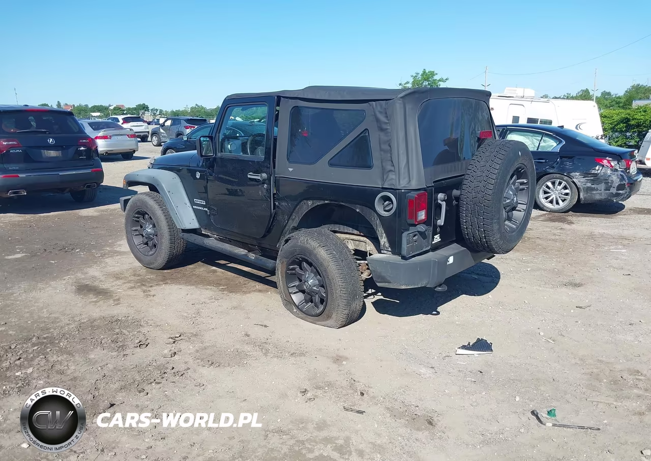 2011 Jeep Wrangler Sport VIN:1J4AA2D10BL557860 - 3