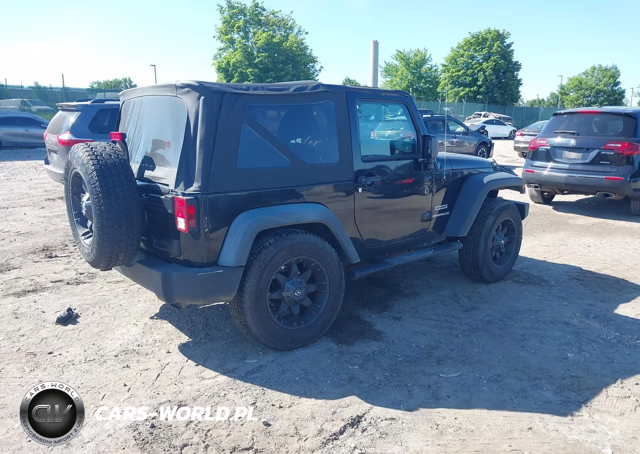 2011 Jeep Wrangler Sport VIN:1J4AA2D10BL557860 - 4