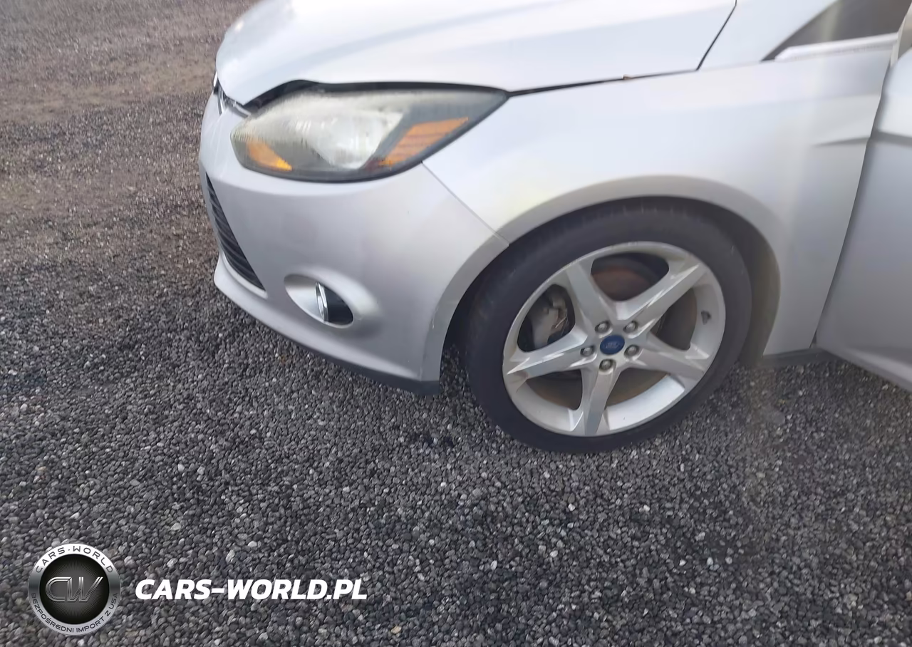2014 Ford Focus Titanium VIN:1FADP3J24EL422654 - 6