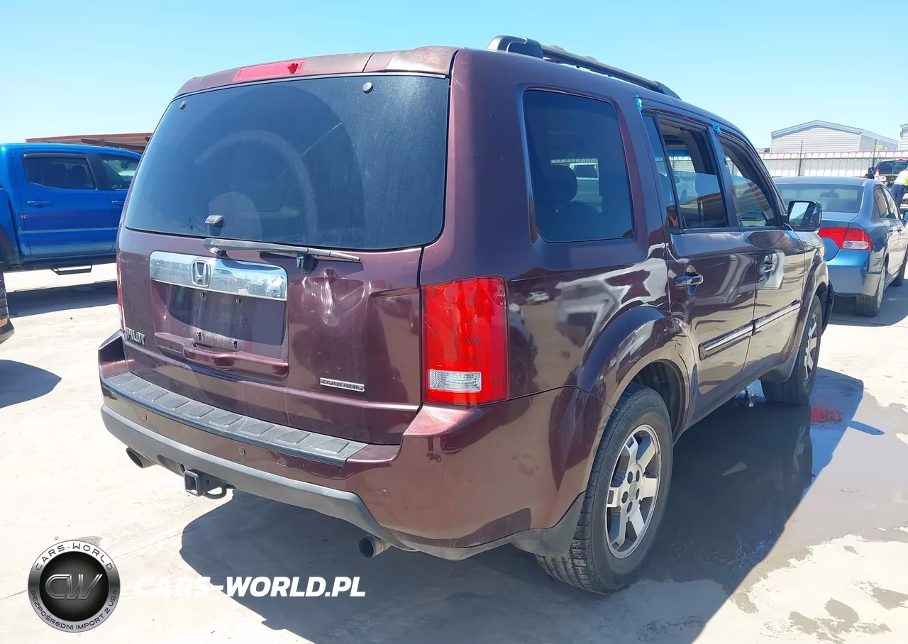 2011 Honda Pilot Touring VIN:5FNYF3H96BB019128 - 4