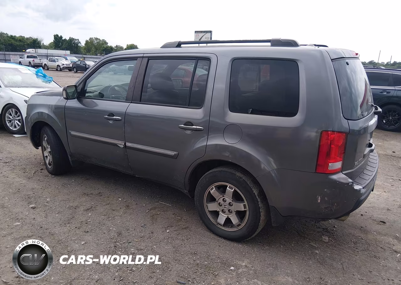 2011 Honda Pilot Touring VIN:5FNYF4H91BB070218 - 3