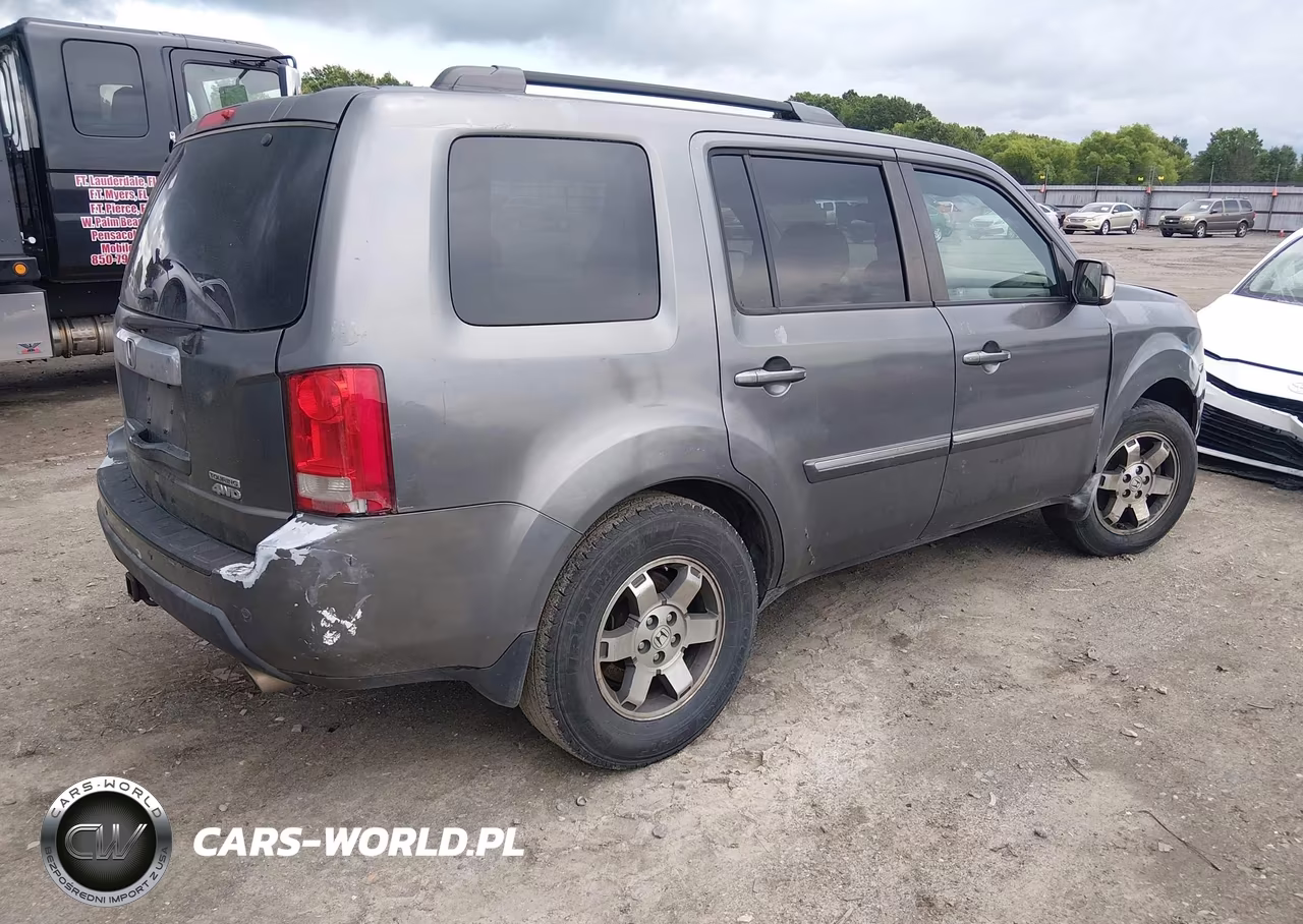 2011 Honda Pilot Touring VIN:5FNYF4H91BB070218 - 4