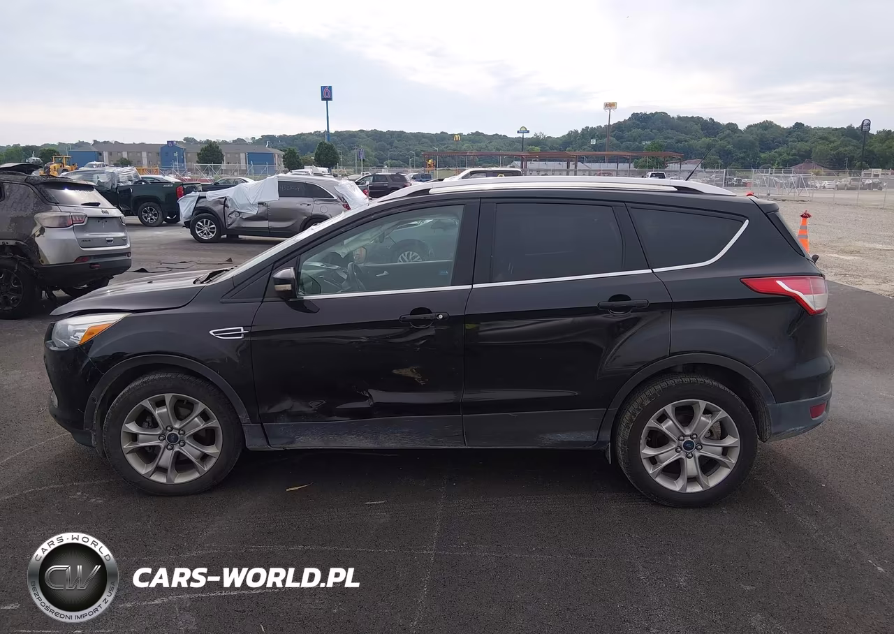 2016 Ford Escape Titanium VIN:1FMCU0JX6GUA37727 - 14