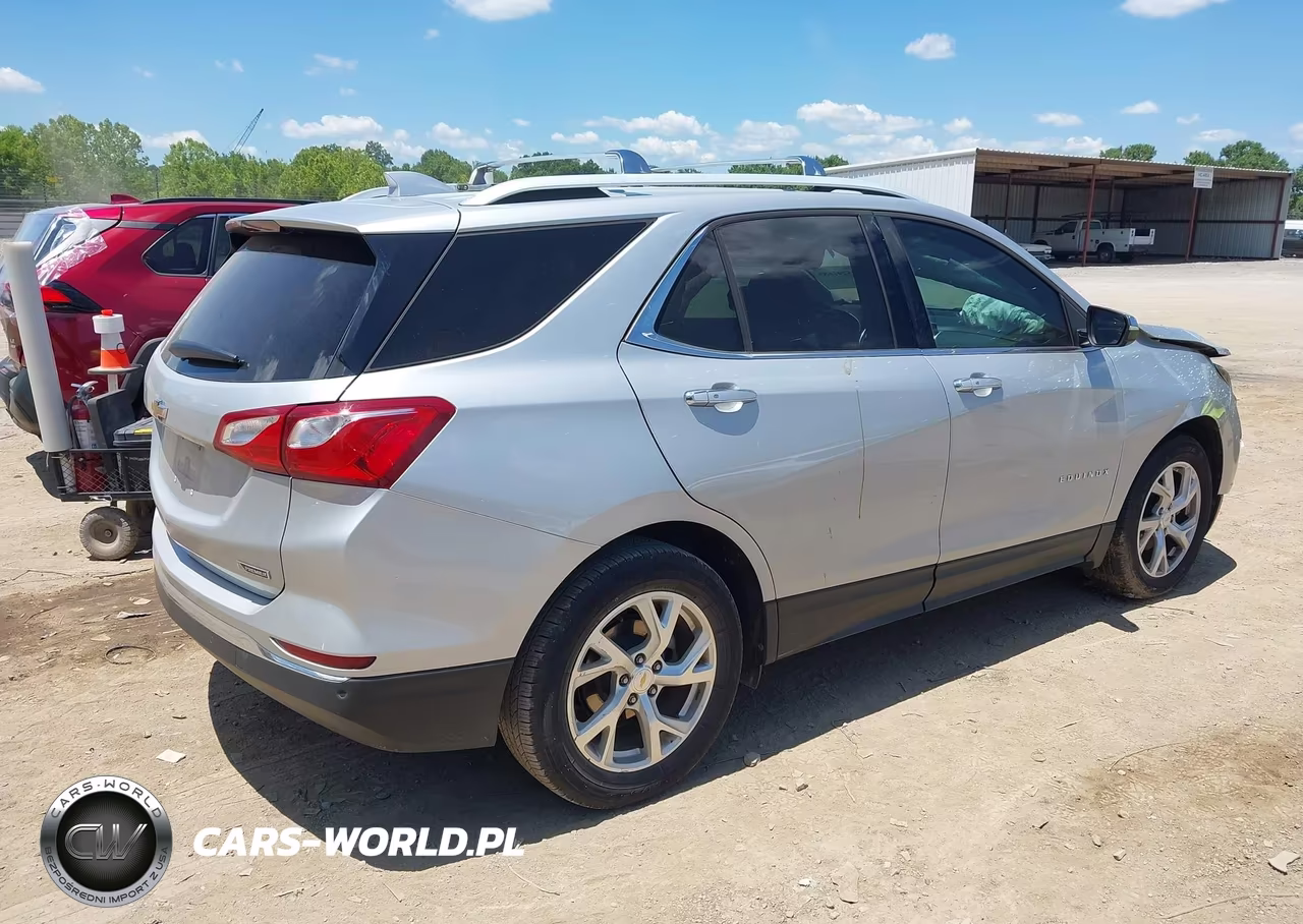 2018 Chevrolet Equinox Premier VIN:2GNAXMEV4J6184337 - 4
