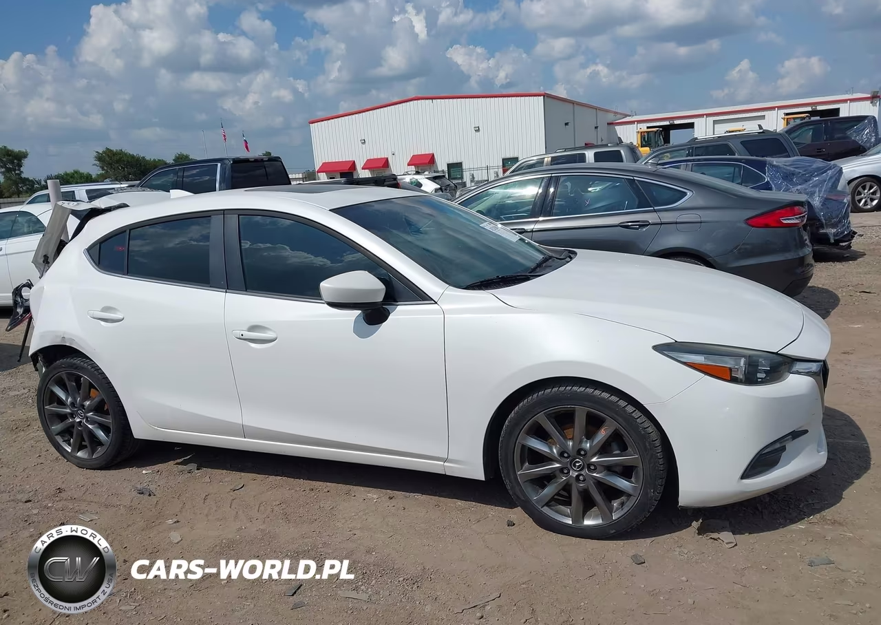 2018 Mazda Mazda3 Touring VIN:3MZBN1L33JM190894 - 13