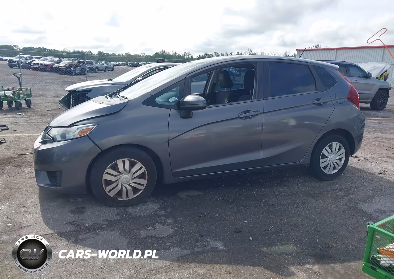 2015 Honda Fit Lx VIN:3HGGK5G50FM740887 - 14