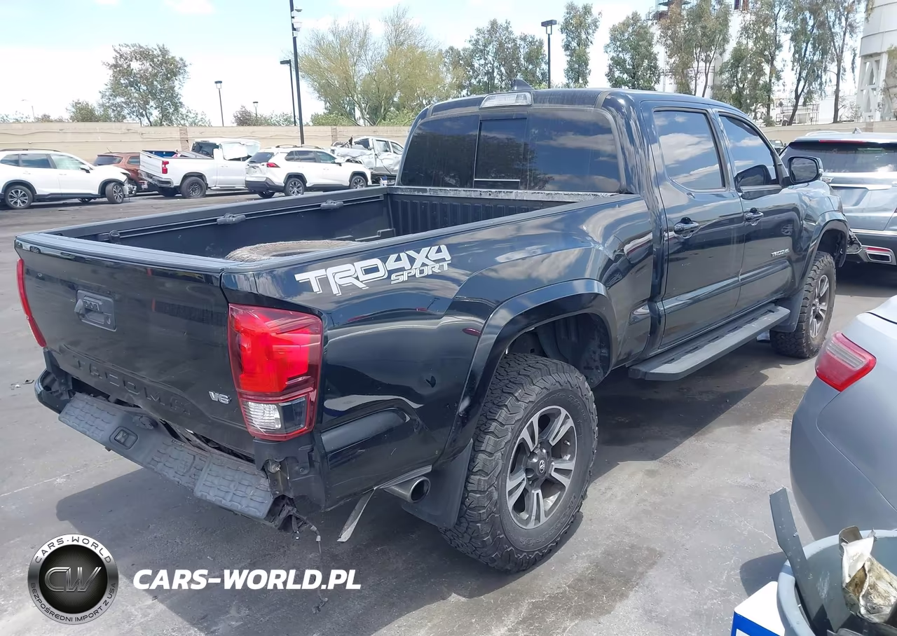 2018 Toyota Tacoma Trd Sport VIN:3TMDZ5BN3JM054100 - 4
