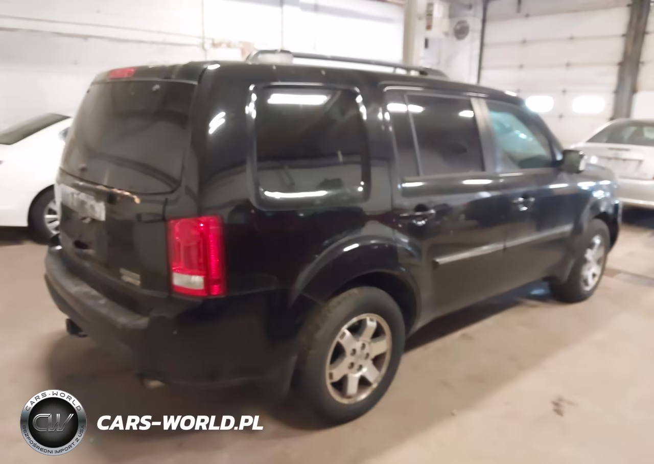 2011 Honda Pilot Touring VIN:5FNYF4H98BB017547 - 4