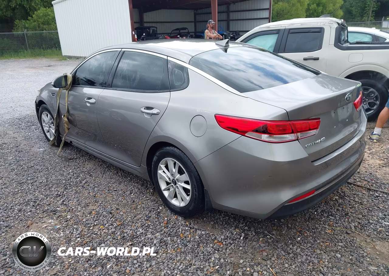 KIA OPTIMA VIN:5XXGT4L36GG083123 - 3