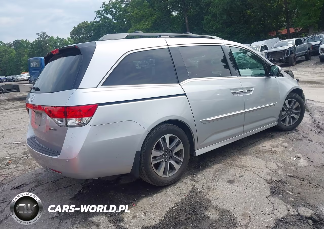 2014 Honda Odyssey Touring-Touring Elite VIN:5FNRL5H9XEB077370 - 4