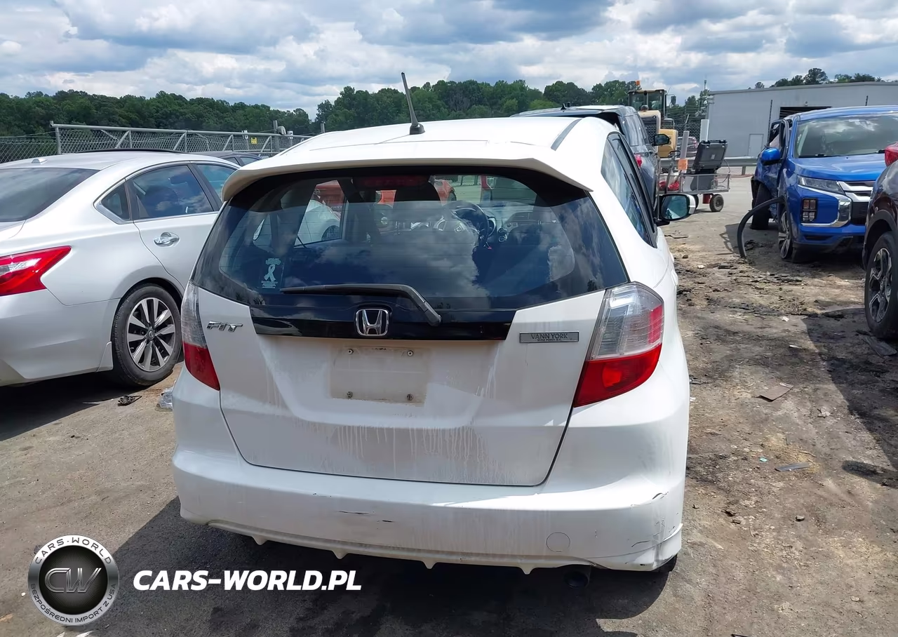 2009 Honda Fit Sport VIN:JHMGE88419S028962 - 16