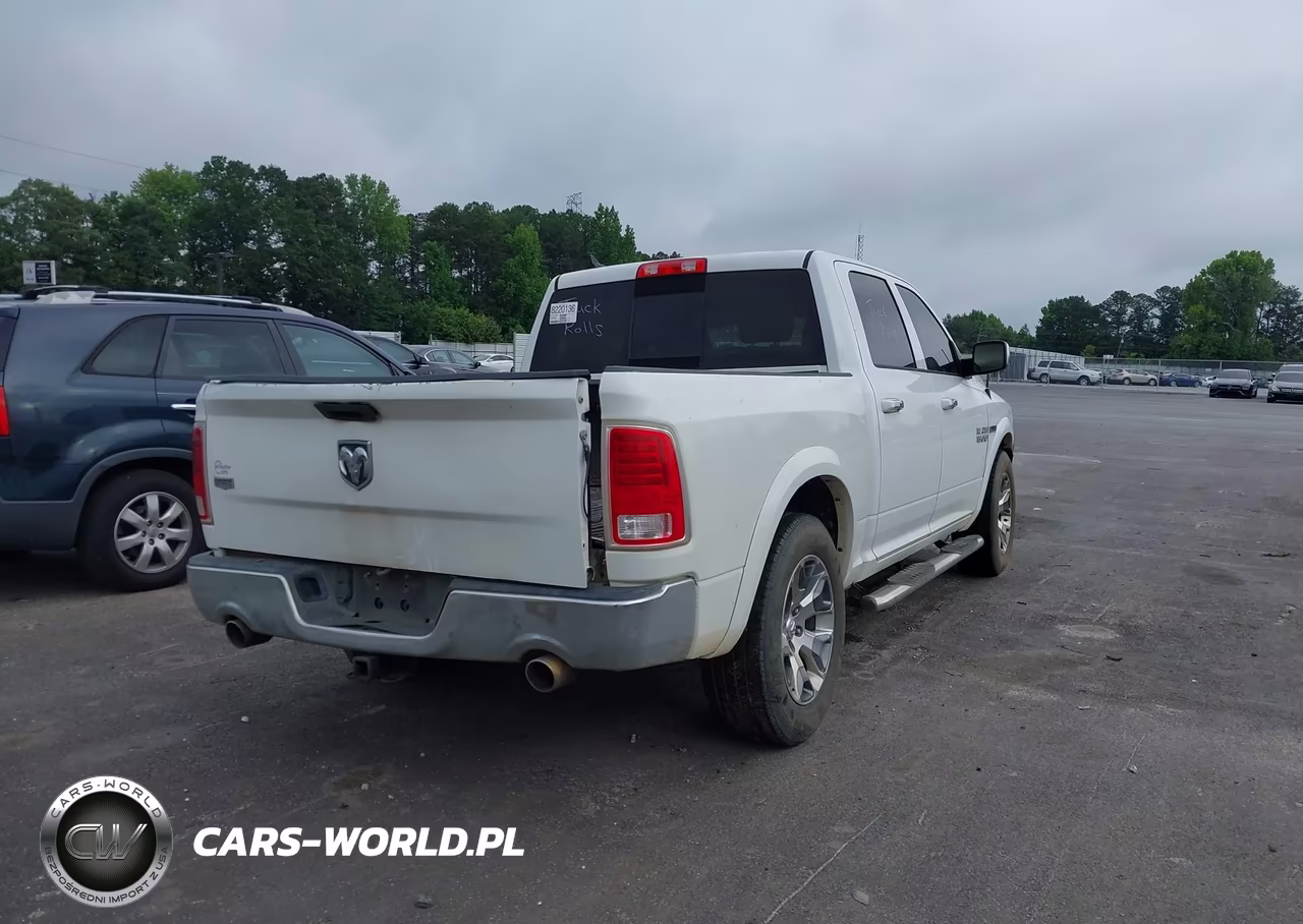 2015 Ram 1500 Laramie VIN:1C6RR6NMXFS578056 - 4