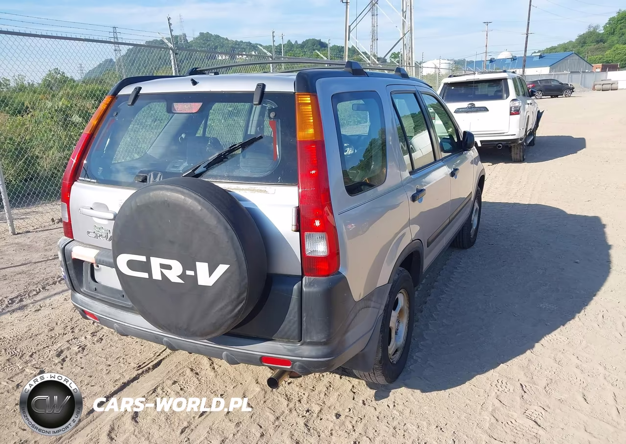 2004 Honda Cr-V Lx VIN:JHLRD78414C057388 - 4