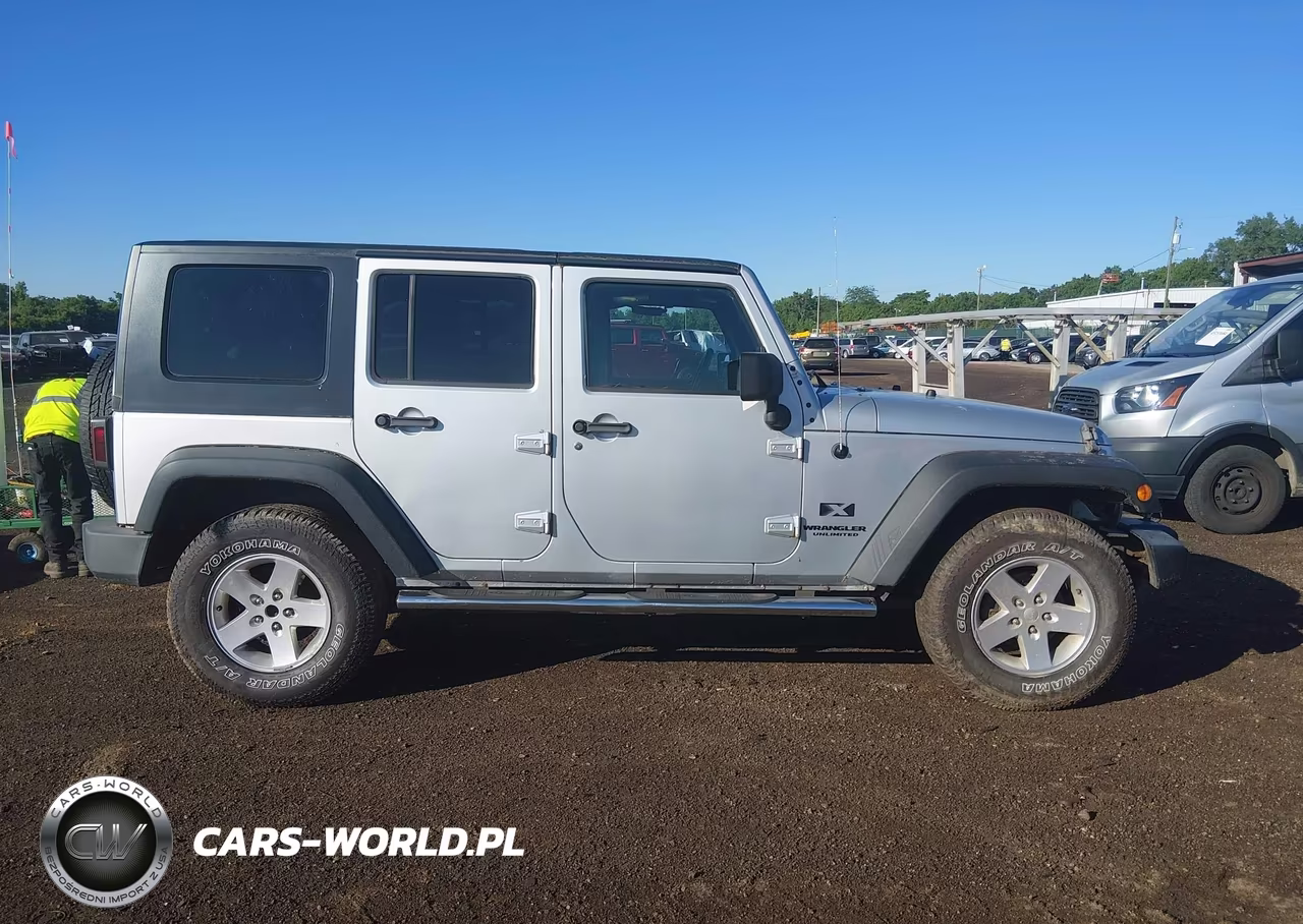 2009 Jeep Wrangler Unlimited X VIN:1J4GA39129L722682 - 13