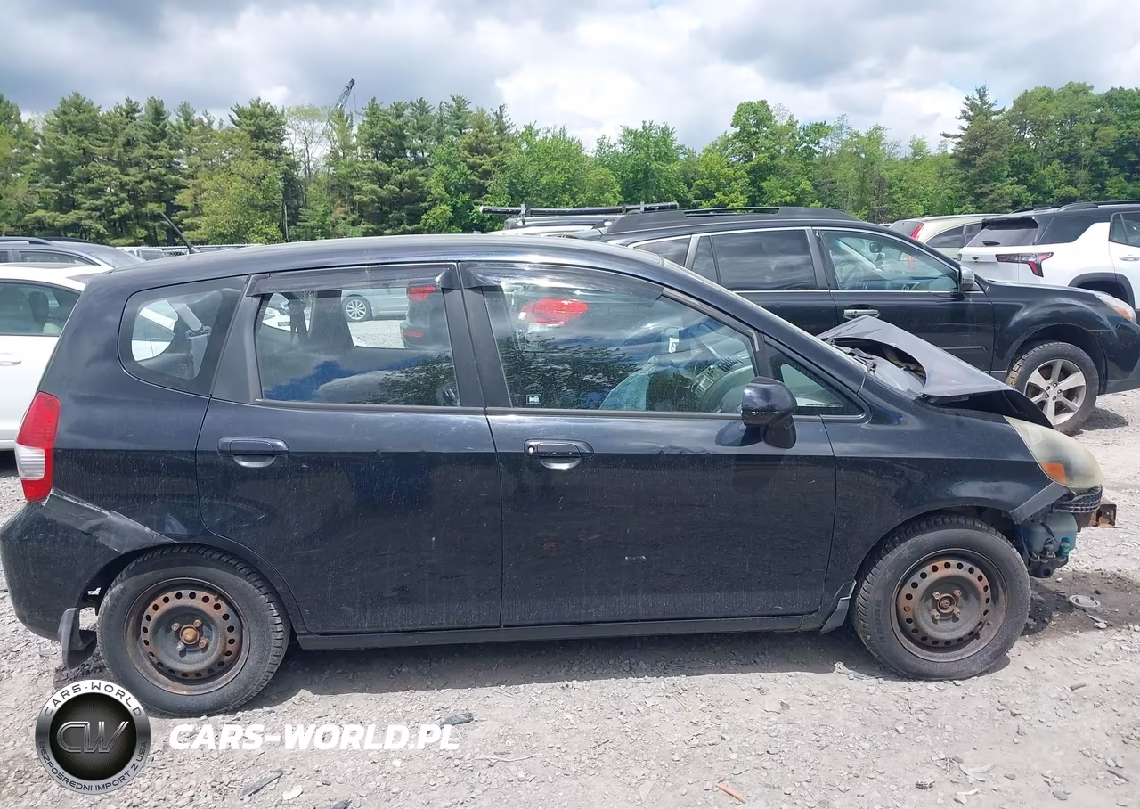 2007 Honda Fit VIN:JHMGD38477S012963 - 12