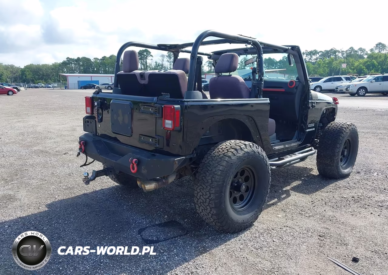 2013 Jeep Wrangler Sport VIN:1C4AJWAG1DL644370 - 4