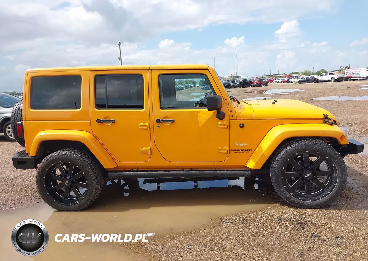 2012 Jeep Wrangler Unlimited Sahara VIN:1C4HJWEG6CL161240 - 14