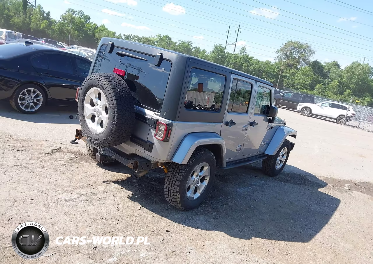 2014 Jeep Wrangler Unlimited Sahara VIN:1C4HJWEG6EL189025 - 4