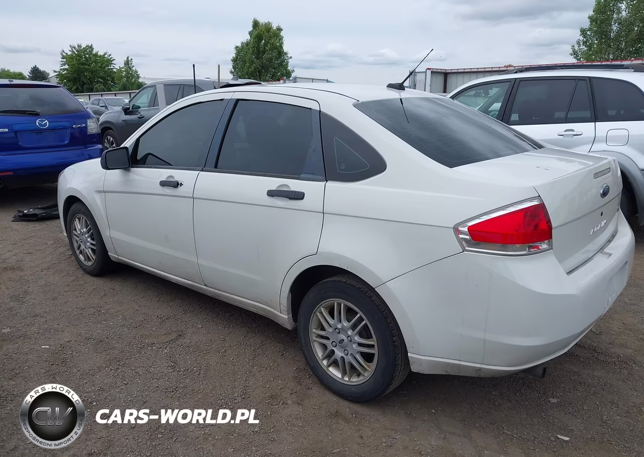 2009 Ford Focus Se VIN:1FAHP35N49W140427 - 3