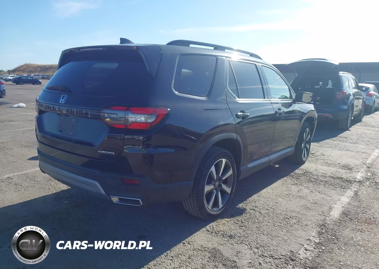 2023 Honda Pilot Awd Touring VIN:5FNYG1H79PB000919 - 4