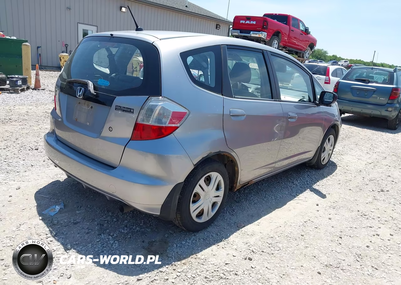 2009 Honda Fit VIN:JHMGE88299S045779 - 4
