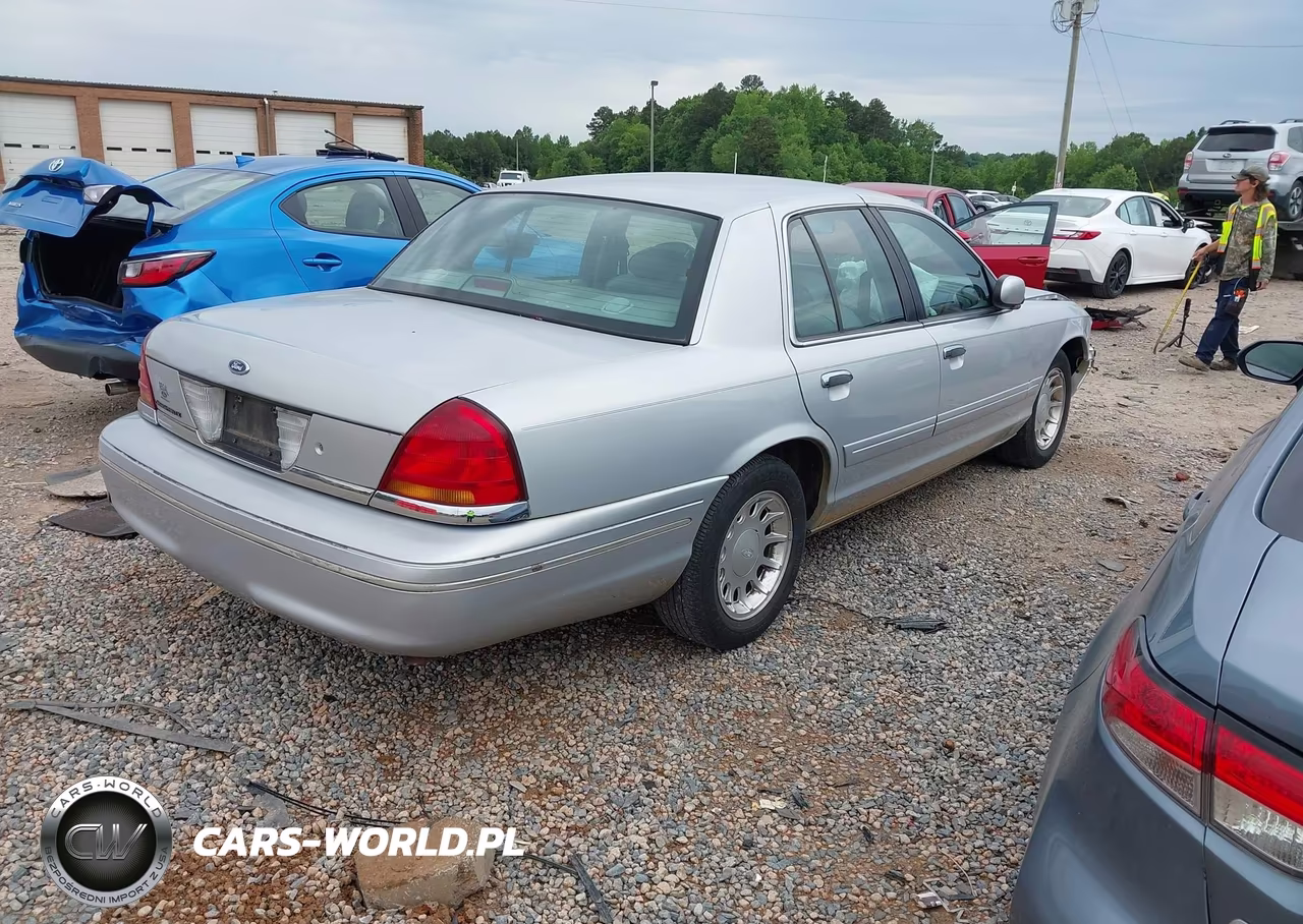 2000 Ford Crown Victoria Lx VIN:2FAFP74W1YX184185 - 4