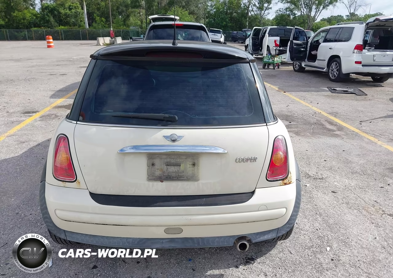 2003 Mini Cooper VIN:WMWRC33423TE16701 - 16