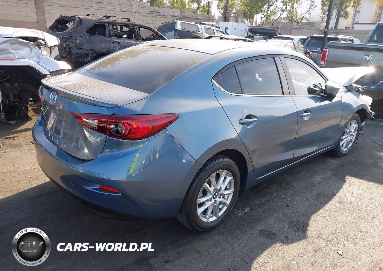 2015 Mazda Mazda3 I Touring VIN:JM1BM1V7XF1259414 - 4