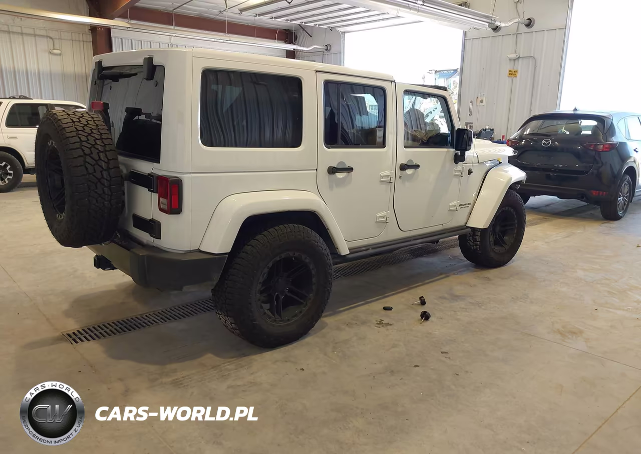 2015 Jeep Wrangler Unlimited Altitude VIN:1C4BJWEG1FL717089 - 4