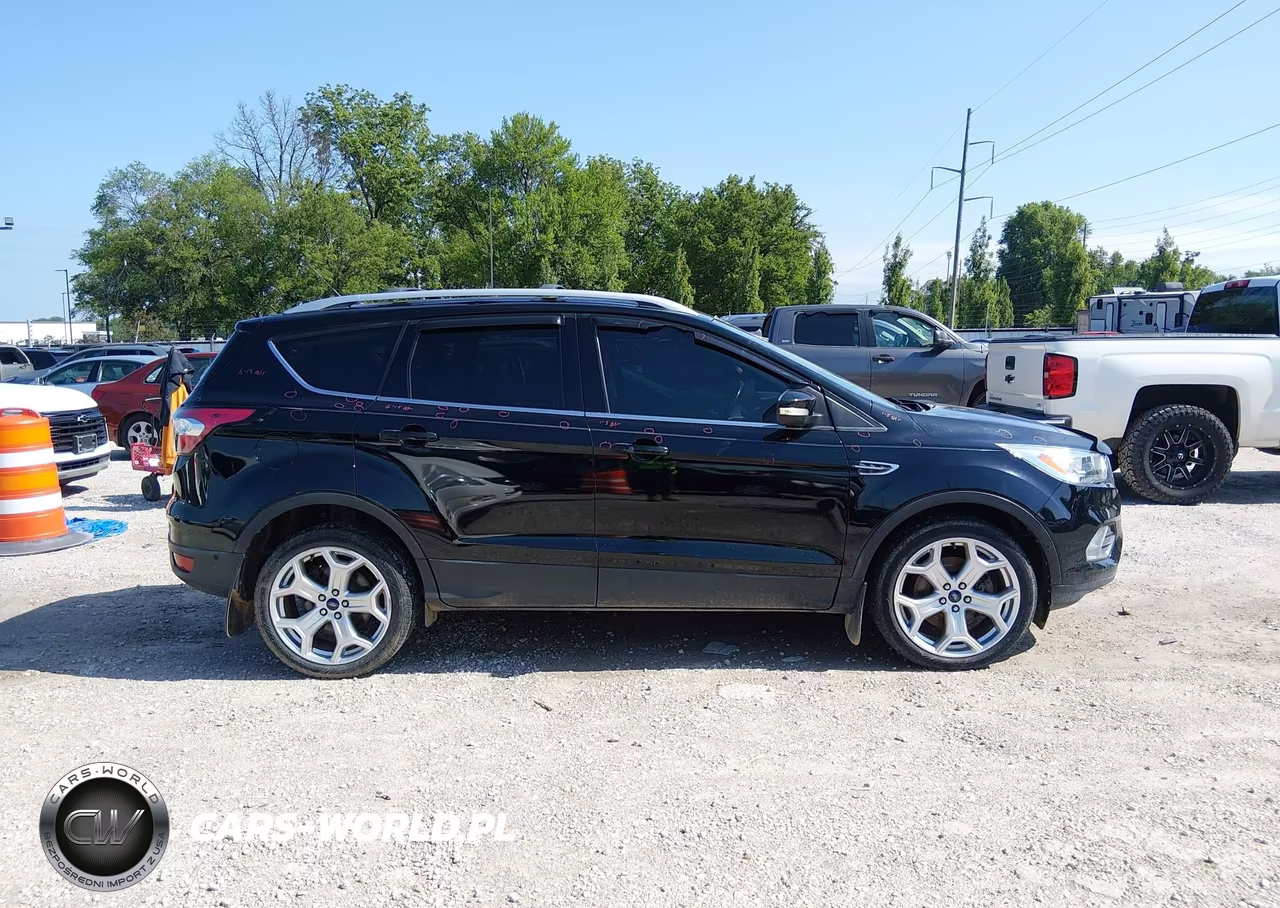 2017 Ford Escape Titanium VIN:1FMCU9J94HUB62202 - 13