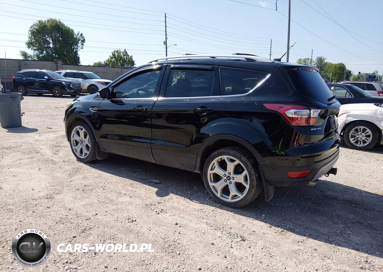 2017 Ford Escape Titanium VIN:1FMCU9J94HUB62202 - 3