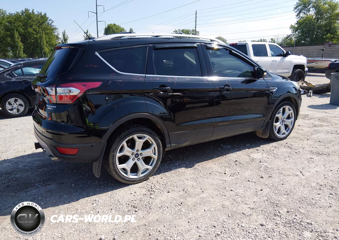 2017 Ford Escape Titanium VIN:1FMCU9J94HUB62202 - 4